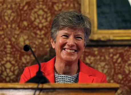 FILE - In this May 16, 2014 file photo, Attorney Mary Bonauto smiles during her speech at the Cambridge City Hall in Cambridge, Mass. to mark the 10th anniversary of the first same-sex weddings in Massachusetts and the nation. Five lawyers will...