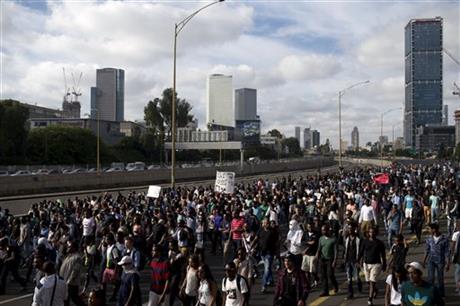 Israel's Jewish Ethiopians block highway during a protest against racism and police brutality in Tel Aviv, Israel, Sunday, May 3, 2015. Several thousand people, mostly from Israel's Jewish Ethiopian minority, protested in Tel Aviv against racism...