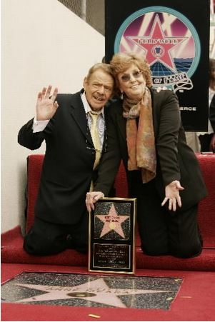 Actors Jerry Stiller and Anne Meara wave to supporters in February 2007 as they are honored with a star on the Hollywood Walk of Fame in Los Angeles. (AP/Damian Dovarganes)