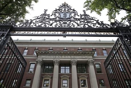 In this Thursday, May 28, 2015 photo, a gate over the entrance of Barnard College is seen in New York. Barnard, like other women's colleges, has always admitted only students born as women, but the class of 2020 may be different. Soon Barnard's...