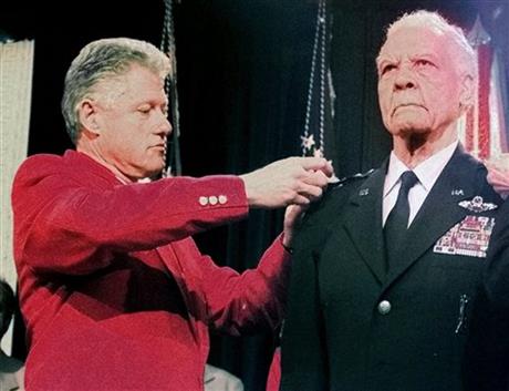 FILE--In this Dec. 9, 1998 file photo, President Clinton pins a fourth star on the shoulder of Lt. Gen. Benjamin O. Davis Jr., USAF retired, during a ceremony honoring his service in Washington. Davis Jr. entered West Point in 1932 as its only...