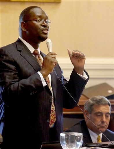 In this June 3, 2014 photo, state Sen. Clementa Pinckney speaks at the South Carolina Statehouse in Columbia, S.C. Pinckney was killed, Wednesday, June 17, 2015, in a shooting at an historic black church in Charleston, S.C. The shooter is still at...