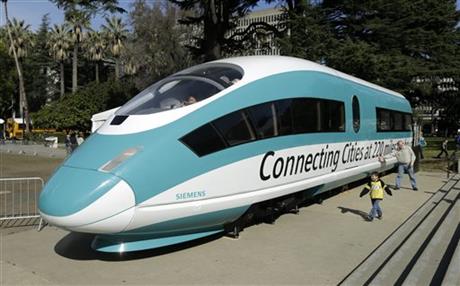 In this Feb. 26, 2015 photo, a full-scale mock-up of a high-speed train is displayed at the Capitol in Sacramento, Calif. In recent decades, political pressure against bullet trains has come from conservatives who argue that such systems should...