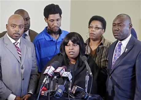 FILE - In this Jan. 6, 2015 file photo, Samaria Rice, center, speaks about the investigation into the death of her son Tamir Rice, at a news conference with attorneys Walter Madison, left, and Benjamin Crump in Cleveland. A judge has ruled that...