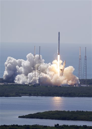 The SpaceX Falcon 9 rocket and Dragon spacecraft lifts off from Space Launch Complex 40 at the Cape Canaveral Air Force Station in Cape Canaveral, Fla., Sunday, June 28, 2015. The rocket carrying supplies to the International Space Station broke...