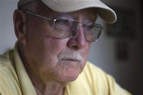 Retired Air Force reserve tech Sgt. Ed Kienle, 73, pauses during an interview at his home, Thursday, June 11, 2015, in Wilmington, Ohio. The government says U.S. Air Force reservists who became ill after being exposed to Agent Orange residue while...