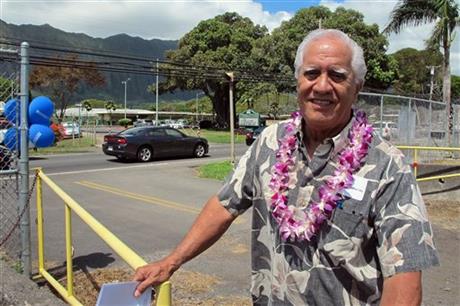 Waimanalo Neighborhood Chairman Wilson Ho poses for a photo at a health fair in Waimanalo, Hawaii on Wednesday, June 10, 2015. Residents in the small town have mixed feelings about one of the beaches recently being declared the best public beach...