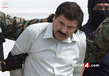 FILE - In this Feb. 22, 2014, file photo, Joaquin "El Chapo" Guzman, head of Mexico’s Sinaloa Cartel, is escorted to a helicopter in Mexico City, following his capture overnight in the beach resort town of Mazatlan. Mexico’s security commission...