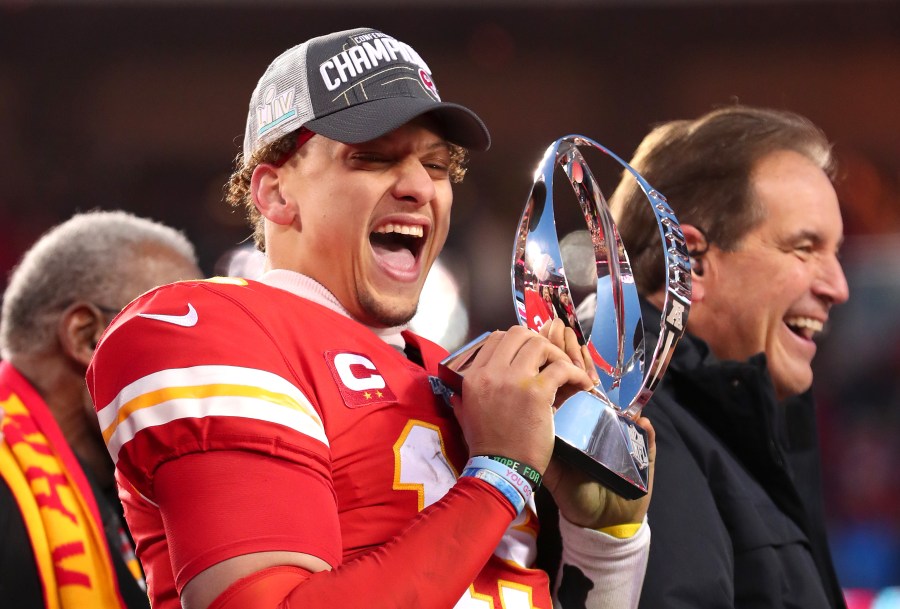 KANSAS CITY, MISSOURI - JANUARY 19: Patrick Mahomes #15 of the Kansas City Chiefs holds up the Lamar Hunt trophy after defeating the Tennessee Titans in the AFC Championship Game at Arrowhead Stadium on January 19, 2020 in Kansas City, Missouri. The Chiefs defeated the Titans 35-24. (Photo by Tom Pennington/Getty Images)