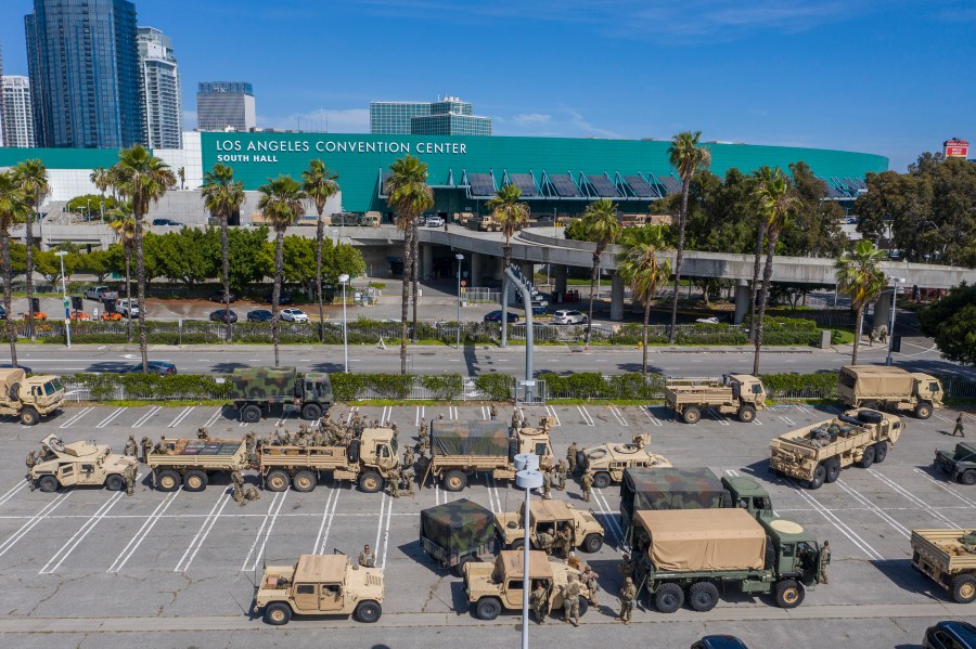 A drone aerial view shows California National Guard troops gathered at the Los Angeles Convention Center after being activated by California Governor Gavin Newsom following violent demonstrations in response to George Floyd’s death. (Photo by David McNew/Getty Images)