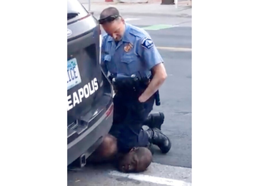 A Minneapolis officer kneels on the neck of George Floyd, a handcuffed man who was pleading that he could not breathe. The death of Floyd has renewed scrutiny of immobilization techniques long used in policing around the world. (Darnella Frazier via AP, File)