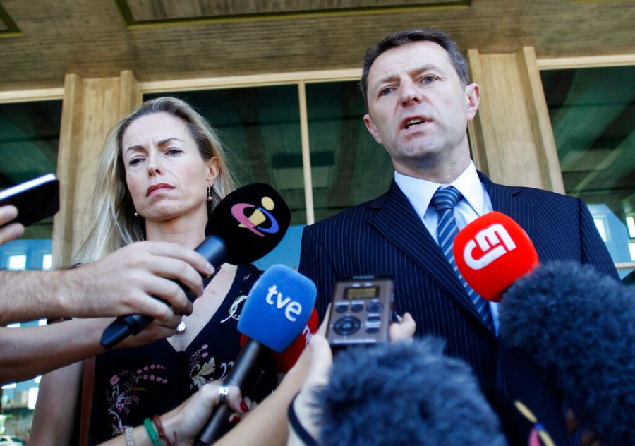 Kate McCann, left, and Gerry McCann, the parents of missing British girl Madeleine McCann, talk to the media outside a court in Lisbon in 2014. Madeleine McCann’s family is hoping for closure in the case after a key suspect was identified in Germany and as authorities there say they believe the missing British girl is dead. (AP Photo/Francisco Seco, File)