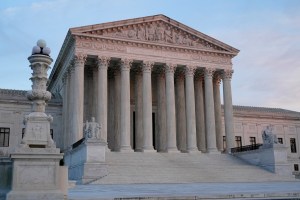 FILE - The setting sun illuminates the Supreme Court building on Capitol Hill in Washington, Jan. 10, 2023. The Supreme Court won’t hear a civil rights case brought by the parents of a teenager who was naked and unarmed when he was fatally shot by an Oklahoma police officer in 2019. The high court on Monday, March 27, rejected without comment the lawsuit bought by Isaiah Lewis' parents. (AP Photo/Patrick Semansky, File)